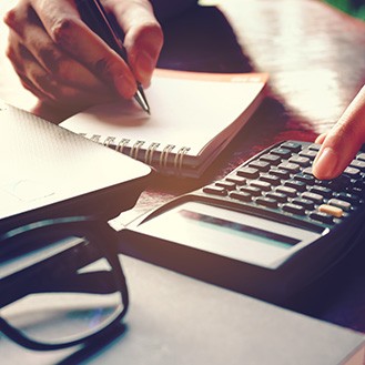 Woman using a calculator