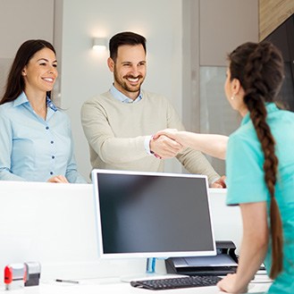 Couple meeting a receptionist